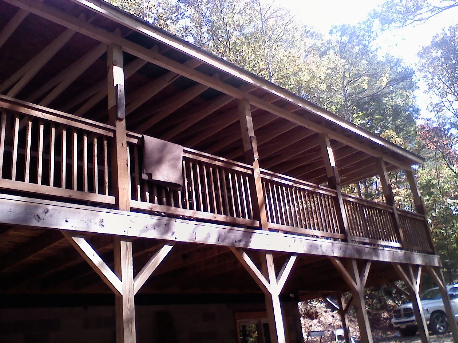 Timber framing under a new elevated porch and deck — Roof Leak Repair in Whitt by Roofing Brothers